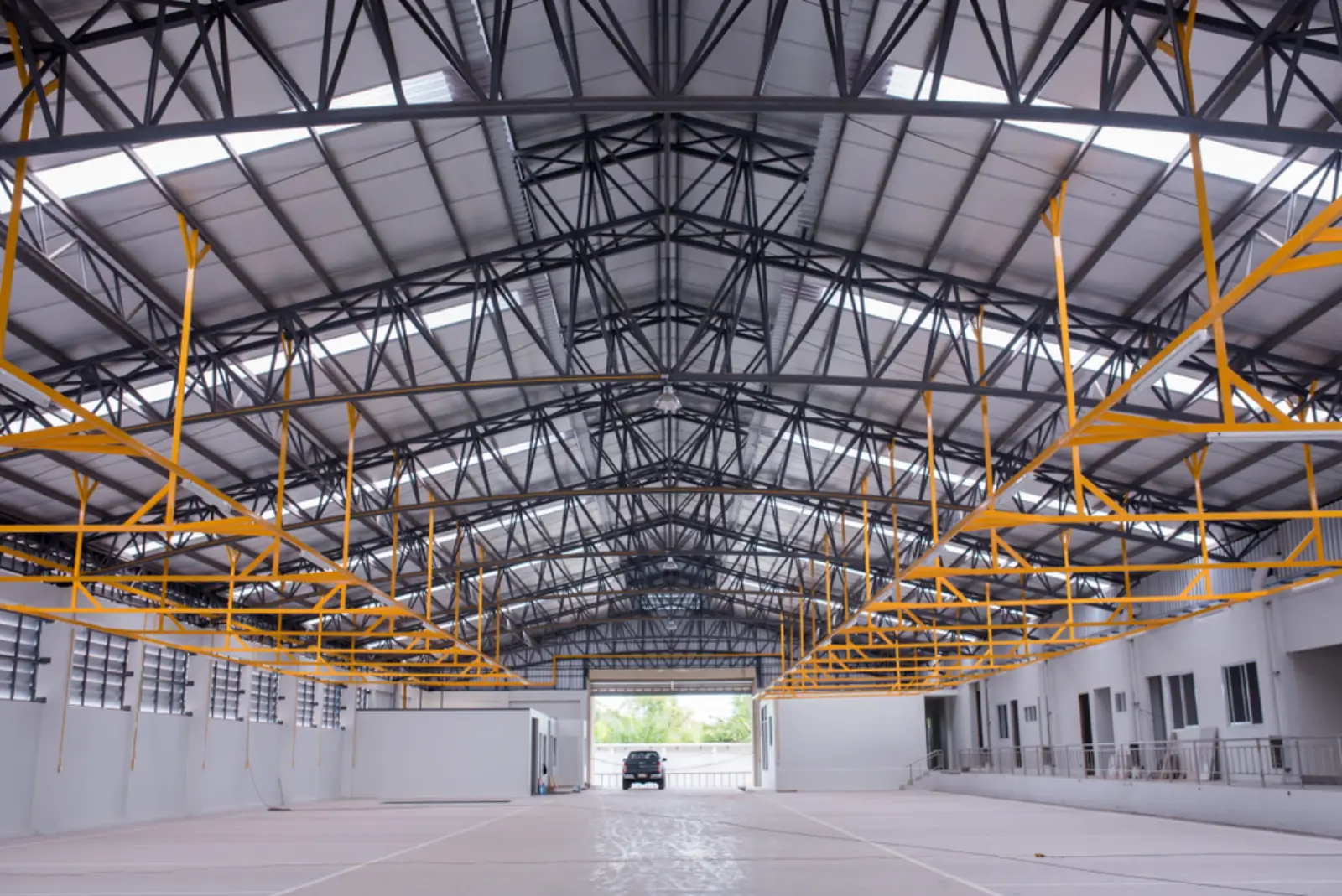 Steel-framed shed interior with exposed trusses, built by sister brand Complete Sheds Australia